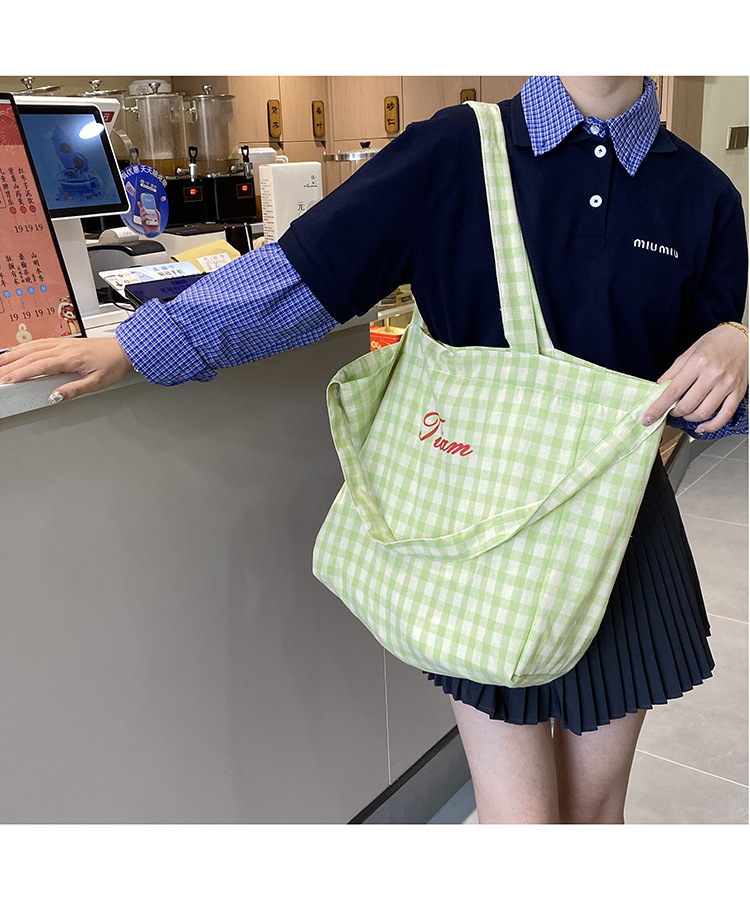 ins风字母格纹大容量托特包女2025新款度假风单肩斜挎包购物包详情17