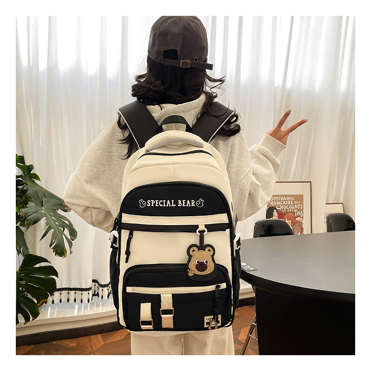 批发新款初高中学生大容量书包轻便减负背包小学生简约结实双肩包详情13