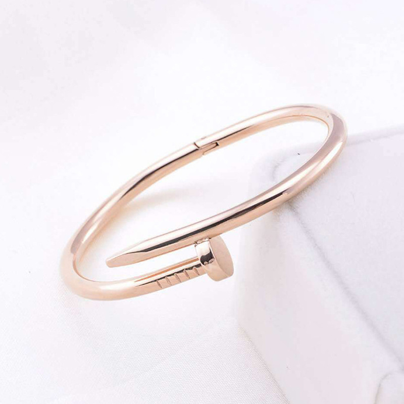 A classic 18k rose gold titanium steel bracelet that is a bestseller in Japan and South Korea. It is a unisex love nail bracelet that does not fade pic 6