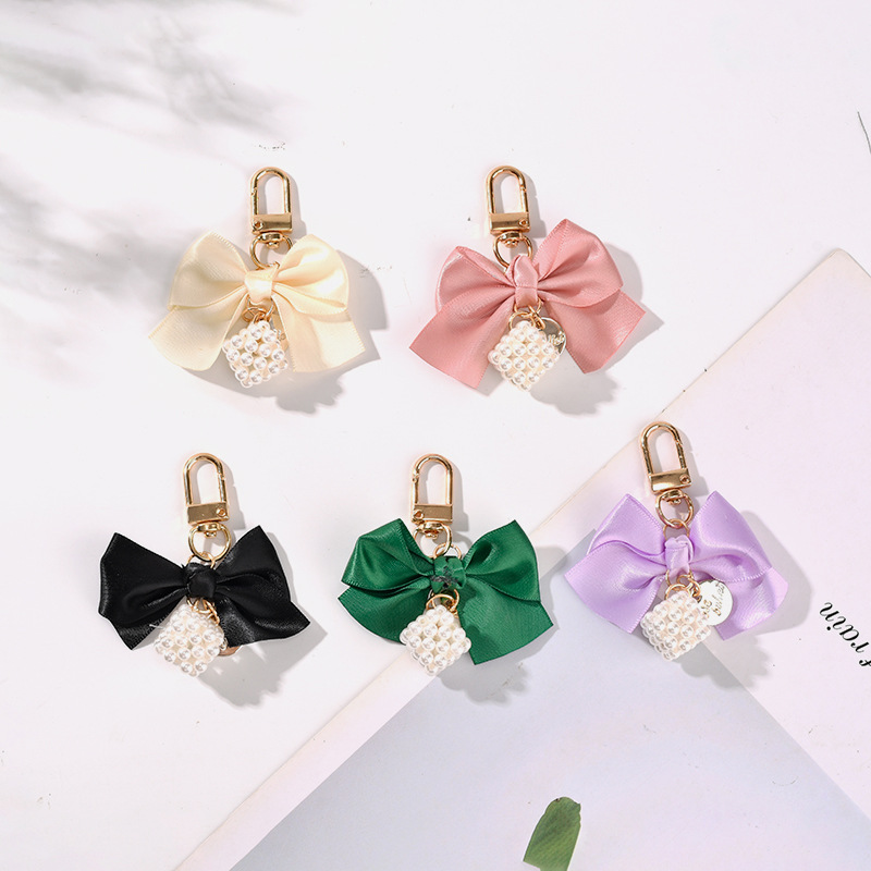 创意珍珠蝴蝶结汽车钥匙扣挂件小清新彩色织带蝴蝶结珍珠魔方配件详情3
