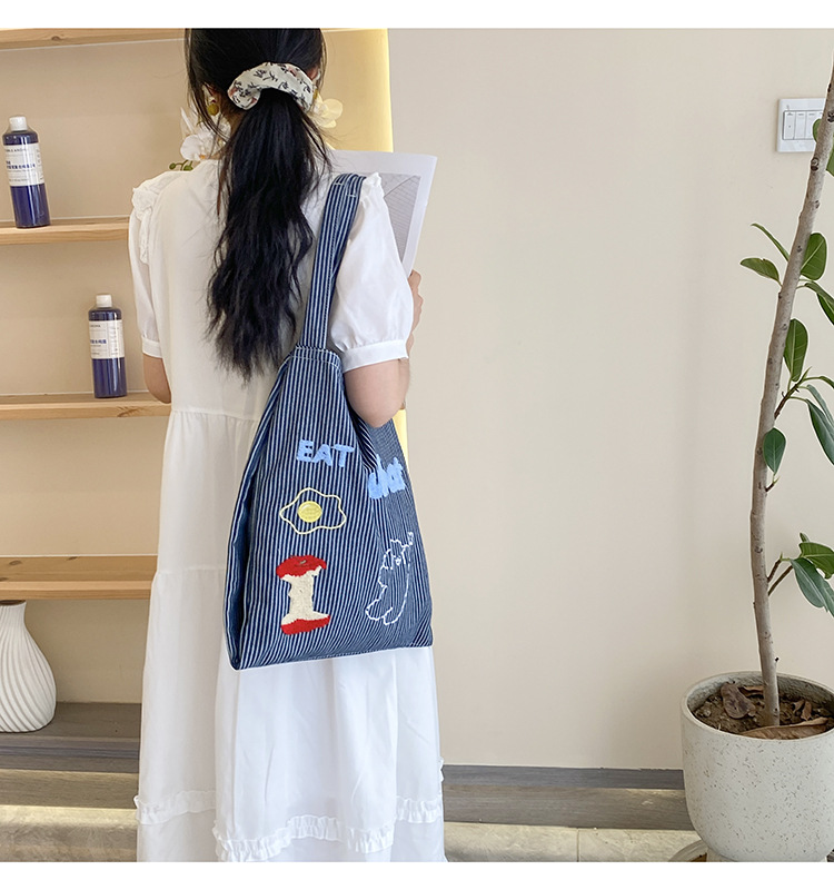 韩版时尚条纹帆布包包女2024新款大容量通勤托特包小众休闲布包详情9