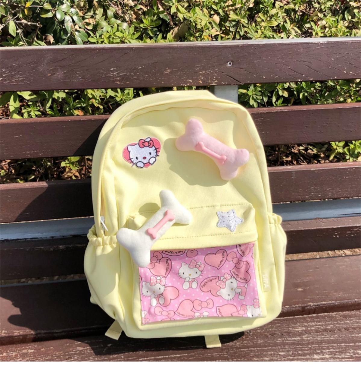 辣妹设计感背包可爱卡通猫猫骨头大容量清新黄色书包大学生双肩包详情5