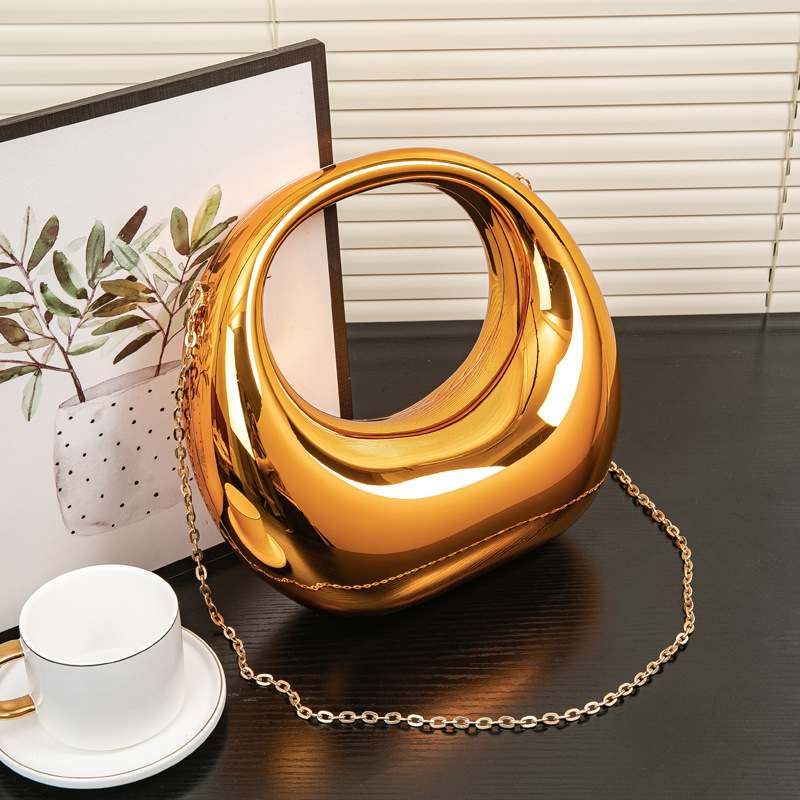 2024春夏欧美爆款跨境弯月包金银晚宴包手提包化妆亚克力包详情10