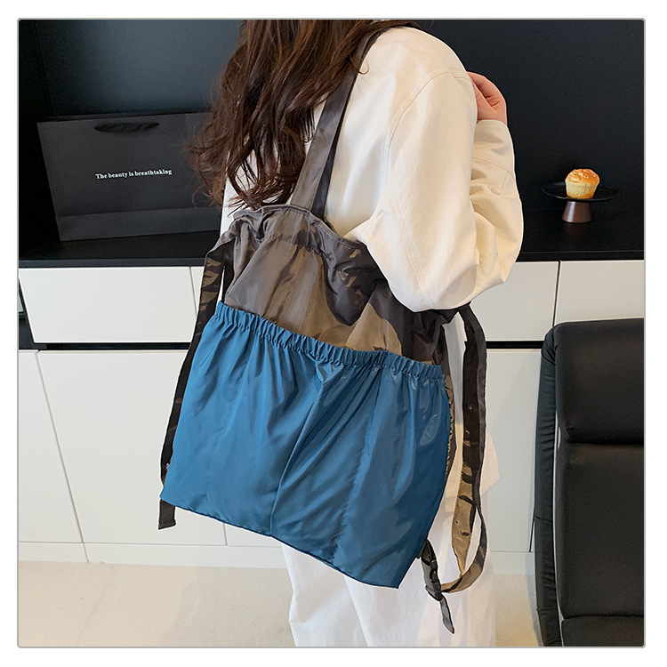 新款单肩包托特双肩折叠包手提简约通勤大容量时尚便携详情46