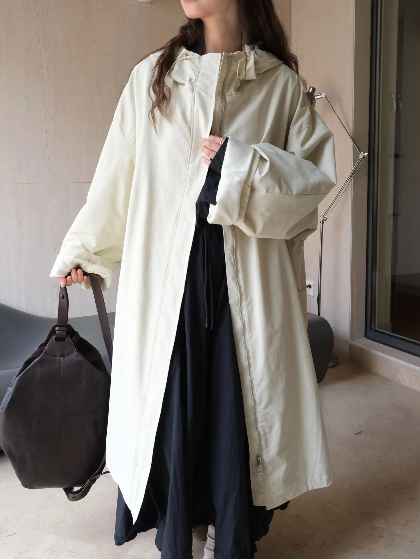 The new autumn Japanese-style outdoor street casual hooded silhouette windbreaker is a slimming and windproof long coat for women pic 10