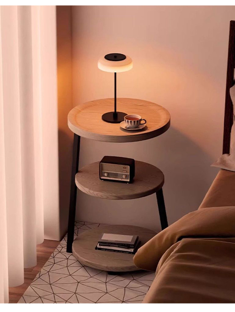The bedside table is a small, vintage, creative round table for home use. It is a three-story bedroom bedside storage rack with a unique design sense pic 14