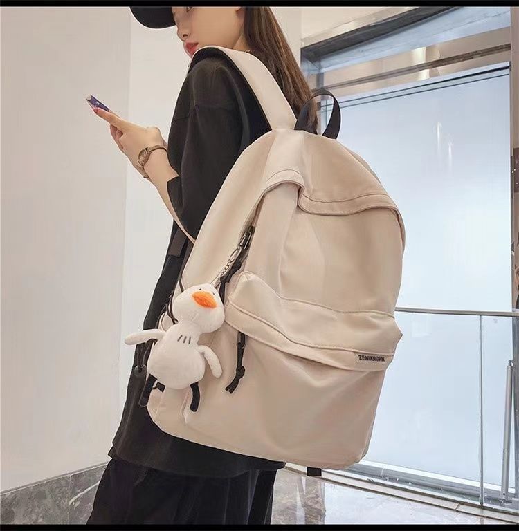 日系初高中学生上课书包男新款洋气质感纯色简约休闲女生双肩背包详情10