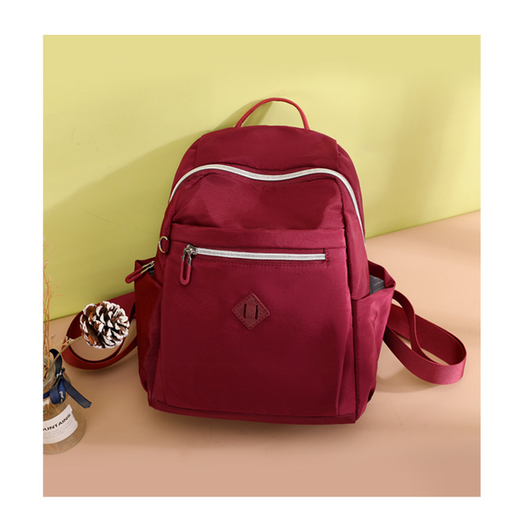 大容量双肩包女士时尚潮流韩版背包防泼水出行旅行包情侣韩版书包详情10