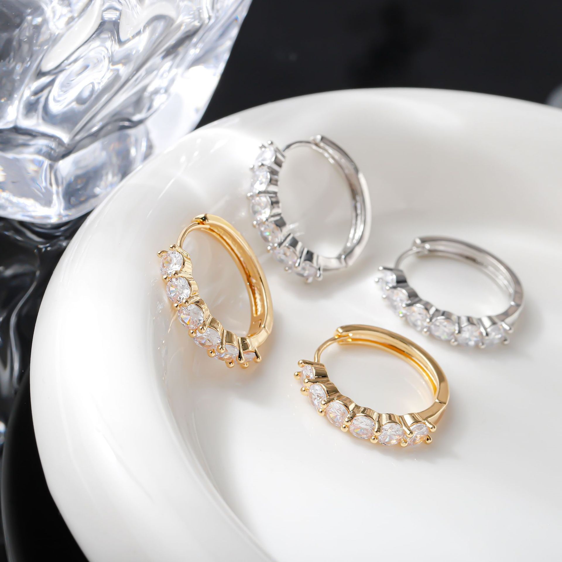 New European and American row diamond imitation moissanite earrings with a light and luxurious style, round zirconia geometric earrings, are selling well on Amazon pic 4