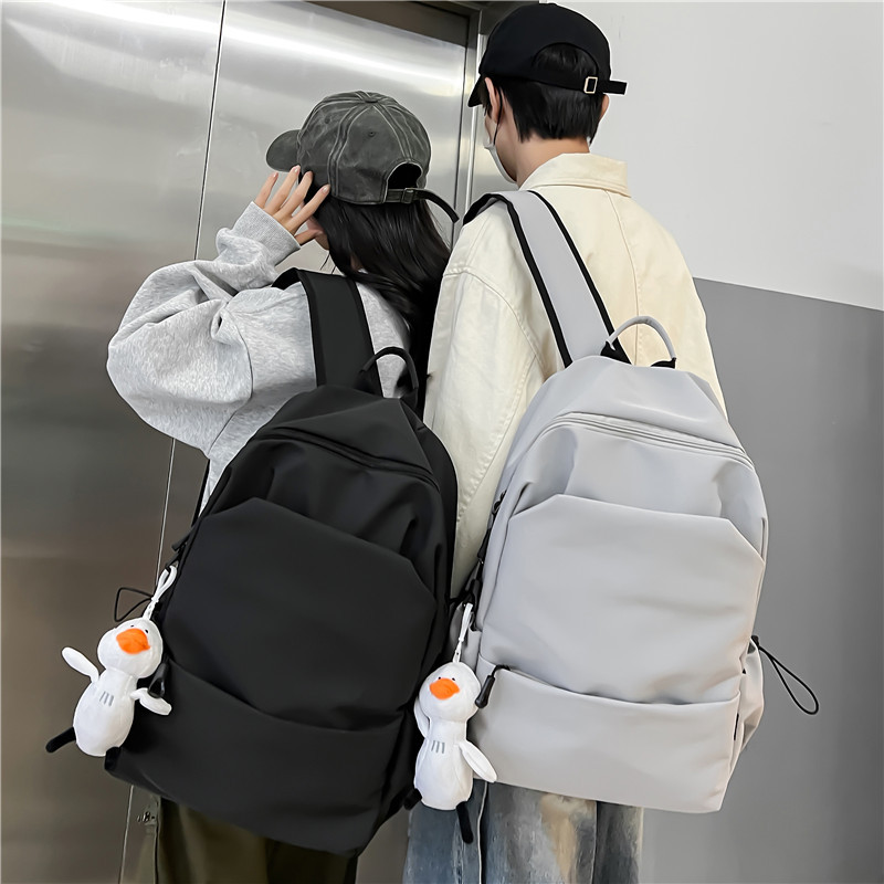 韩系大容量纯色双肩包女韩版简约百搭书包男初中背包女双肩大学生详情8