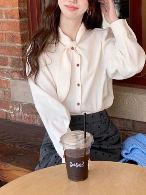 A French retro white bow tie top for women in autumn and winter, paired with a puffed-sleeve corduroy shirt and a stylish inner shirt pic 4