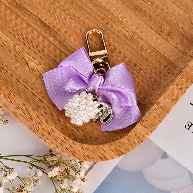 创意珍珠蝴蝶结汽车钥匙扣挂件小清新彩色织带蝴蝶结珍珠魔方配件详情10