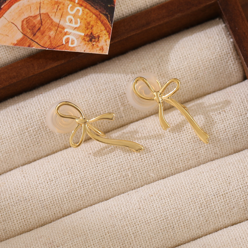 Chanel style simple bow hollowed-out stud earrings for girls, cute and versatile commuting earrings, personalized and trendy earrings wholesale pic 12