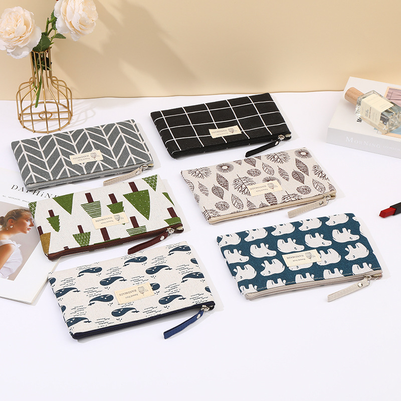 跨境现货布艺化妆包拉链袋多功能便携式收纳手拿洗漱包学生笔袋详情12