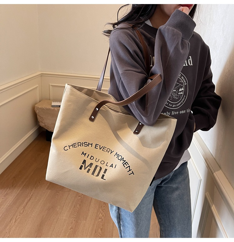 Large-capacity 2025 new style simple single-shoulder hand-carry cloth bag, college student class tote bag, versatile canvas bag for women pic 19