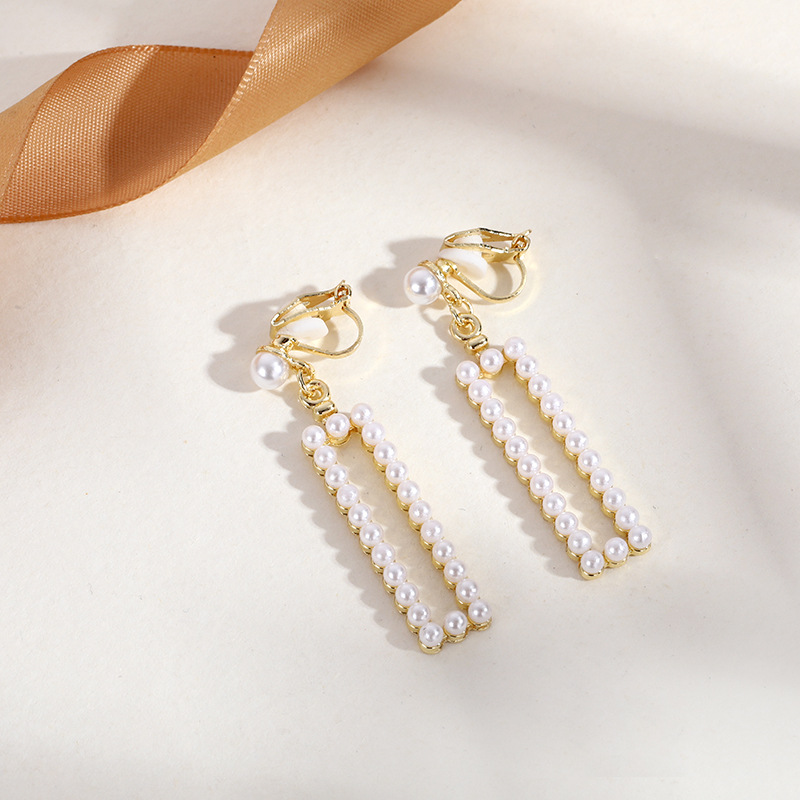 Triangular tassel ear clips, no ear holes, high-end, niche, artistic, retro, socialite ear hangers, light luxury, high-quality earrings wholesale pic 7