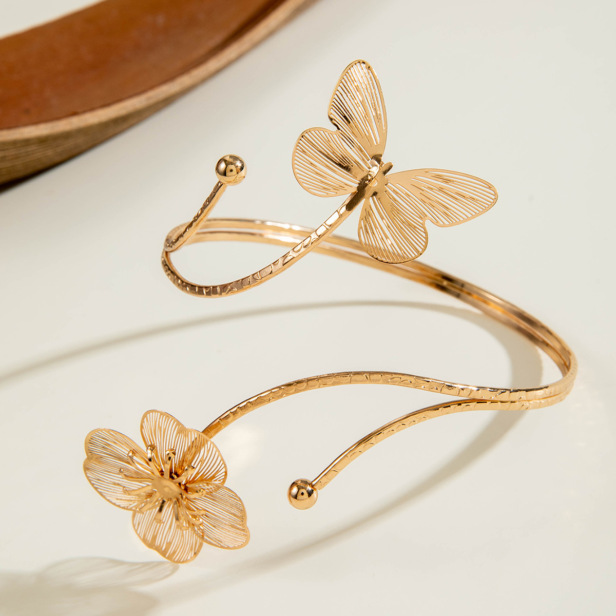 亚马逊跨境个性冷淡风海星手臂镯线条计感蝴蝶环形开口臂镯女详情123