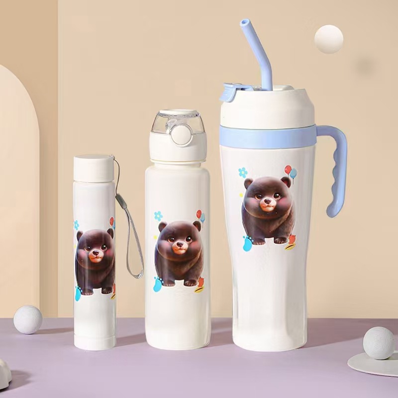 冬季跨境爆款700ML保温杯 小熊图案杯子 跳盖塑料水杯便捷提绳详情5