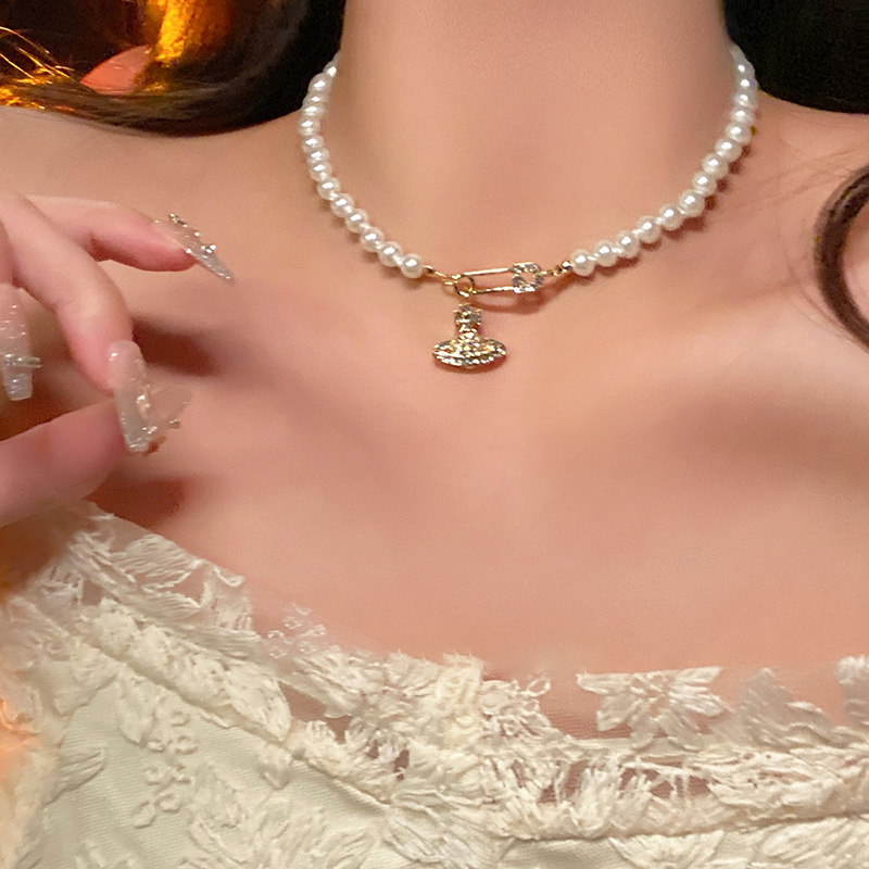 The Western Queen Saturn necklace, female star ball pearl brooch, simple and niche necklace accessory, light luxury and high-end collarbone chain pic 13