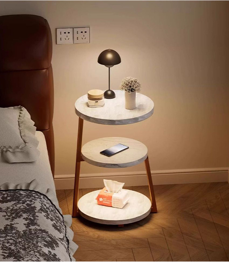 The bedside table is a small, vintage, creative round table for home use. It is a three-story bedroom bedside storage rack with a unique design sense pic 15