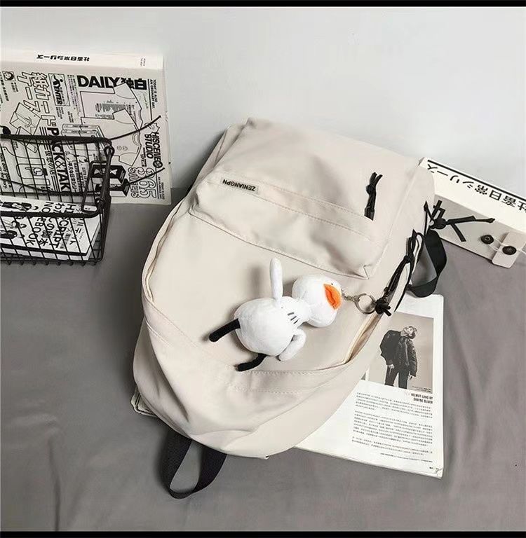 日系初高中学生上课书包男新款洋气质感纯色简约休闲女生双肩背包详情15