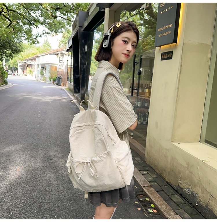 新款时尚轻便简约双肩包女日系文艺学生书包休闲运动旅行纯色背包详情25