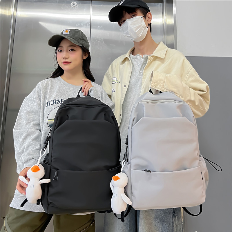 韩系大容量纯色双肩包女韩版简约百搭书包男初中背包女双肩大学生详情12