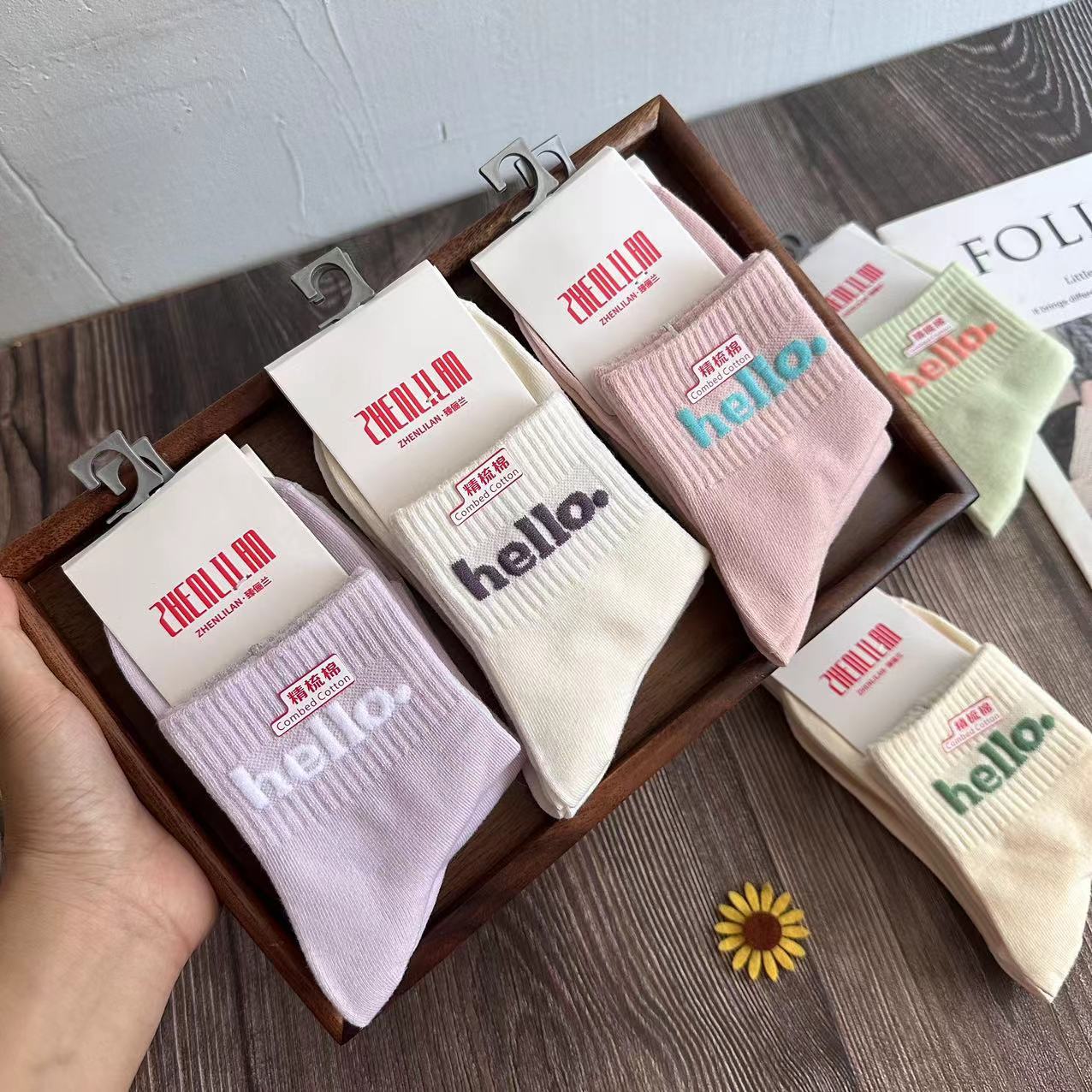 25新款诸暨袜子女秋冬中筒袜韩国穿搭女袜运动袜长袜男女棉袜批发详情11