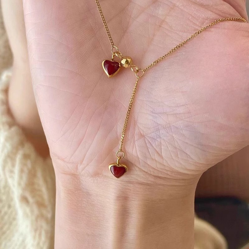 French pull-out wine red small heart-shaped tassel collarbone chain, fashionable, elegant and high-end, titanium steel adjustable necklace for women pic 1