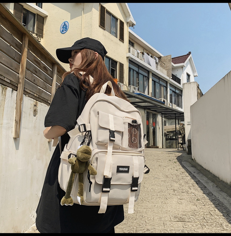 休闲百搭男女双肩包可爱挂件洋气潮流学生书包大容量工装风背包详情23