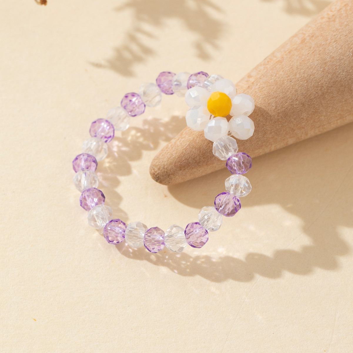 Fresh and elegant elastic rope plum blossom color crystal ring for women, new fashionable and versatile, niche and individual ring jewelry wholesale pic 3