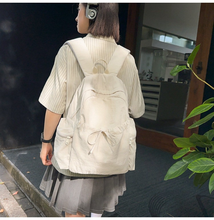 新款时尚轻便简约双肩包女日系文艺学生书包休闲运动旅行纯色背包详情28