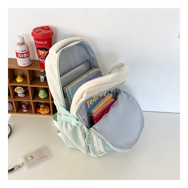 批发新款初高中学生大容量书包轻便减负背包小学生简约结实双肩包详情31