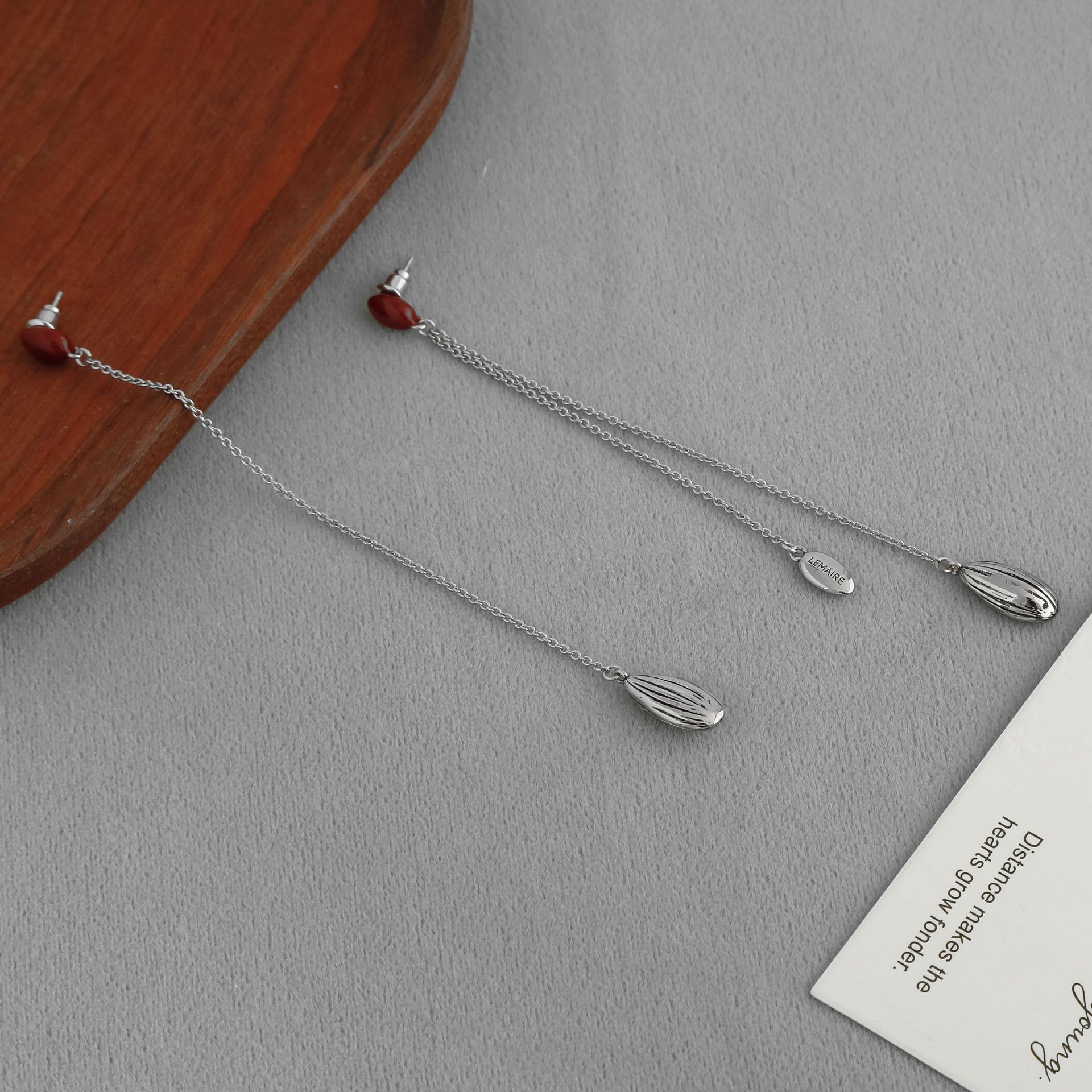 LEM*家银色瓜子流苏耳钉 夏季新款向日葵种子珐琅不对称流苏耳钉详情6