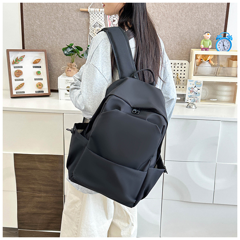 New large-capacity solid color backpacks for girls in foreign trade, simple and elegant school bags for junior and senior high school students pic 16