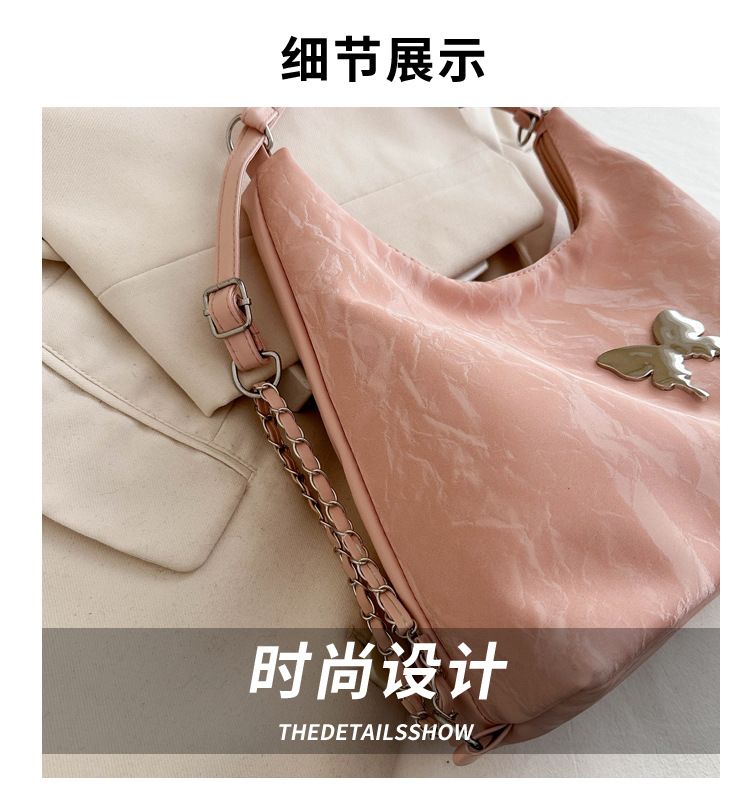 休闲软面大容量女双肩包2024新款背包时尚刺绣蝴蝶简约单肩饺子包详情2