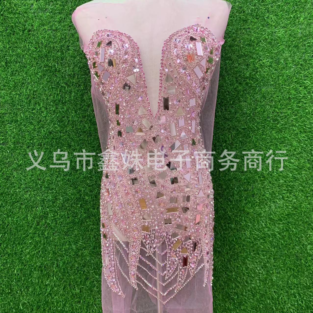 The new deep V wedding dress features heavy handcrafted mirror stitching, beaded mesh and applique pic 3