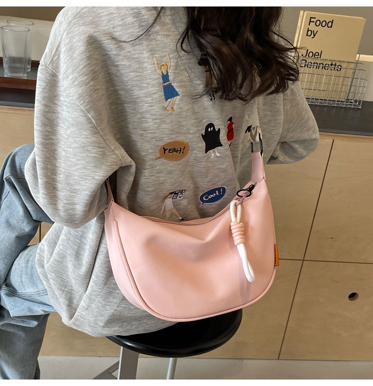 帆布包包女2024新款春夏季百搭饺子包休闲运动宽带单肩斜挎包女包详情13