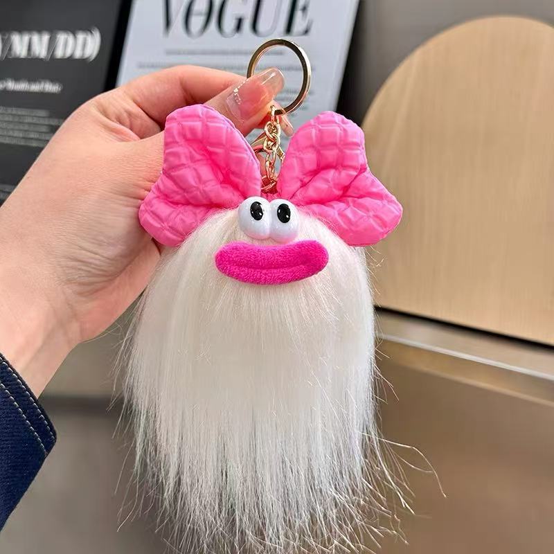 可爱蝴蝶结怪兽娃娃钥匙扣卡通搞怪毛绒书包挂件丑萌玩偶挂饰礼品详情8