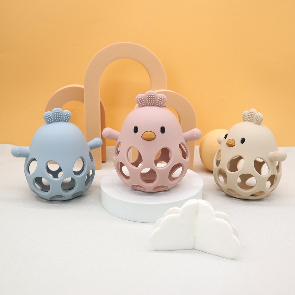 跨境母婴新品宝宝磨牙棒硅胶玩具防吃手小鸡手抓球牙胶婴儿食品级详情1