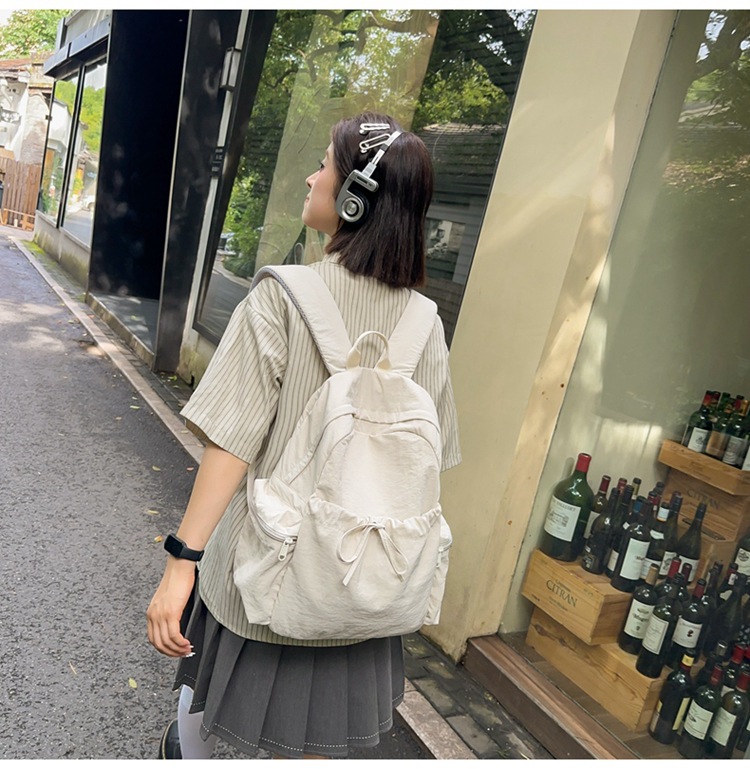 新款时尚轻便简约双肩包女日系文艺学生书包休闲运动旅行纯色背包详情22