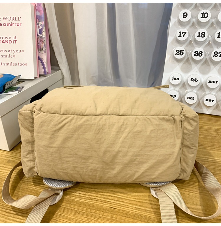 新款时尚轻便简约双肩包女日系文艺学生书包休闲运动旅行纯色背包详情47