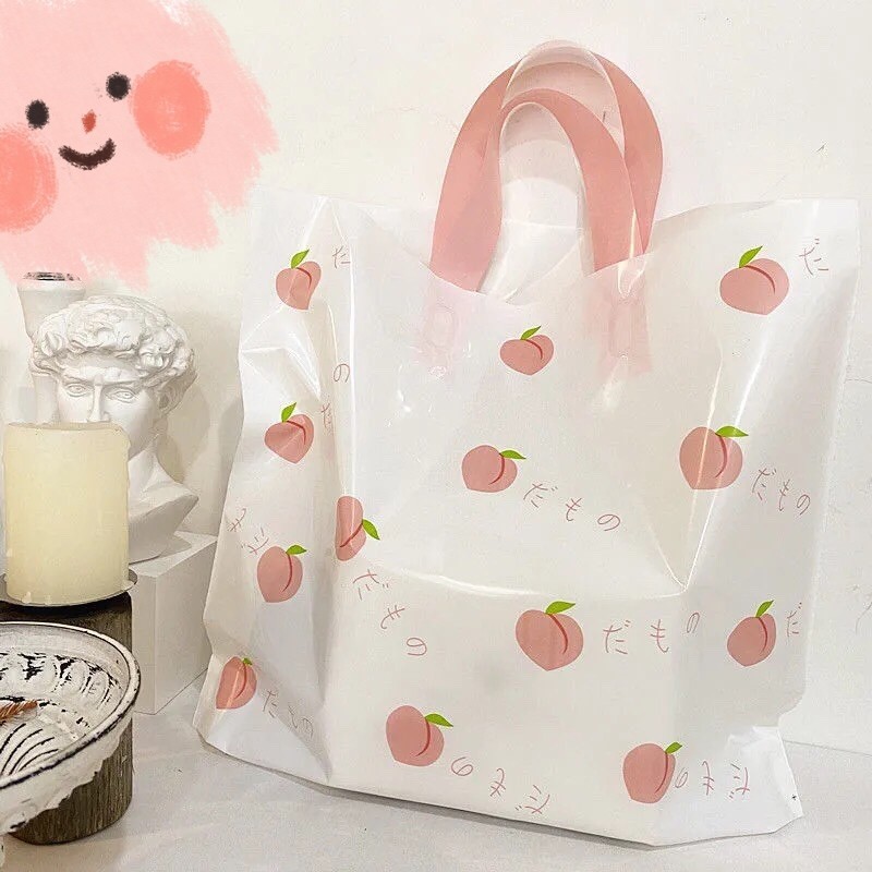 服装店袋子手提塑料袋夏日水蜜桃清新诱惑塑料购物袋化妆品袋包邮详情5