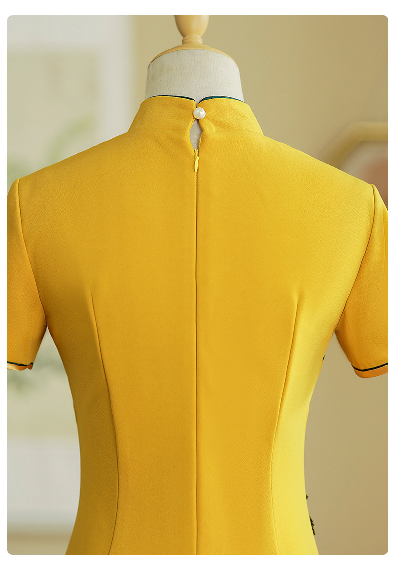 The new national trend cheongsam fashion show performance dress, short-sleeved slimming etiquette figure performance dress, is full of greenery pic 13