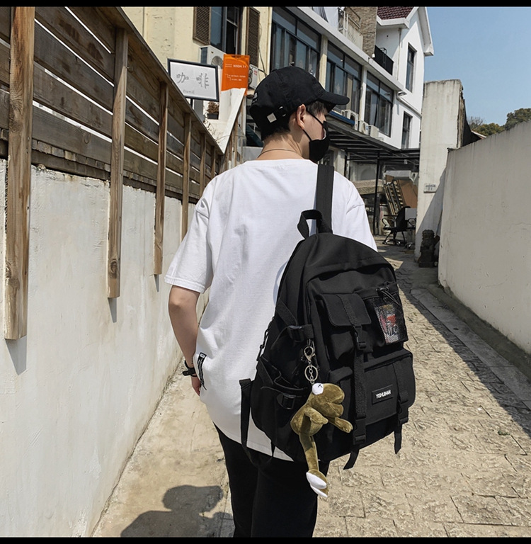 休闲百搭男女双肩包可爱挂件洋气潮流学生书包大容量工装风背包详情36