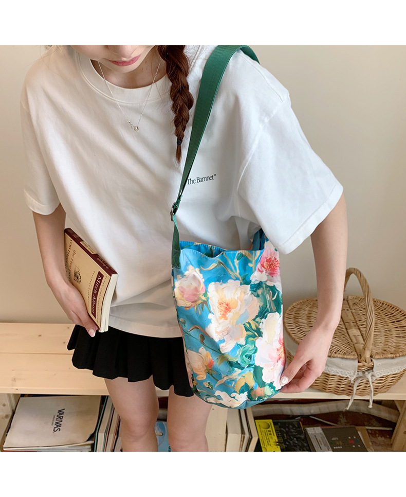 大容量国风印花水桶包女创意花卉个性手提单肩包设计感休闲斜挎包详情38