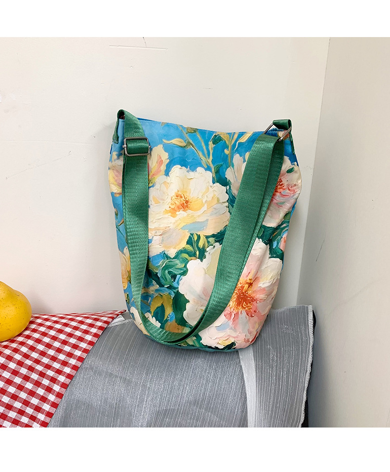大容量国风印花水桶包女创意花卉个性手提单肩包设计感休闲斜挎包详情14