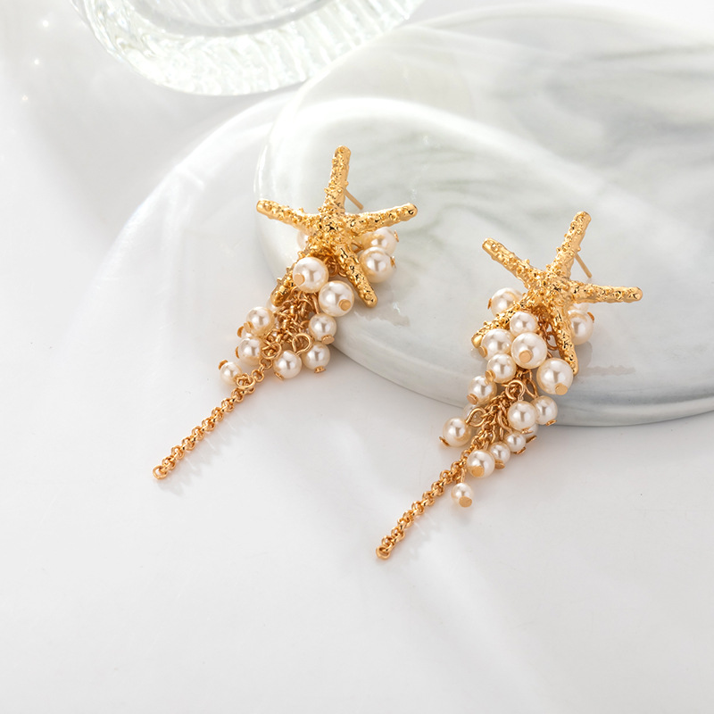 Dulce y refrescante versión coreana pendientes para mujeres niche estrellas conchas collar de perlas diseño de pendientes de alta calidad sentido múltiples orejeras pic 6