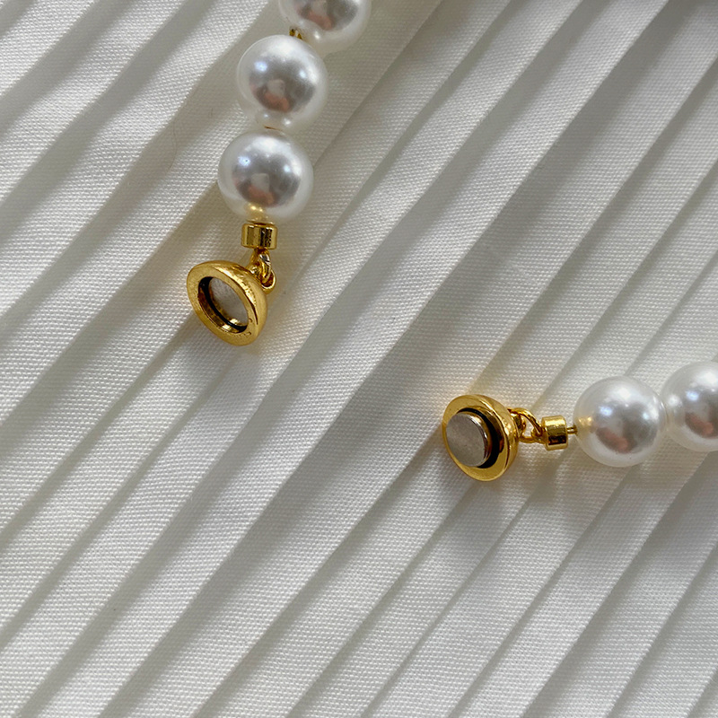 This is a trendy accessory for women, featuring a strong Australian white round magnetic pearl bracelet. It exudes a light luxury, niche and high-end vibe pic 13