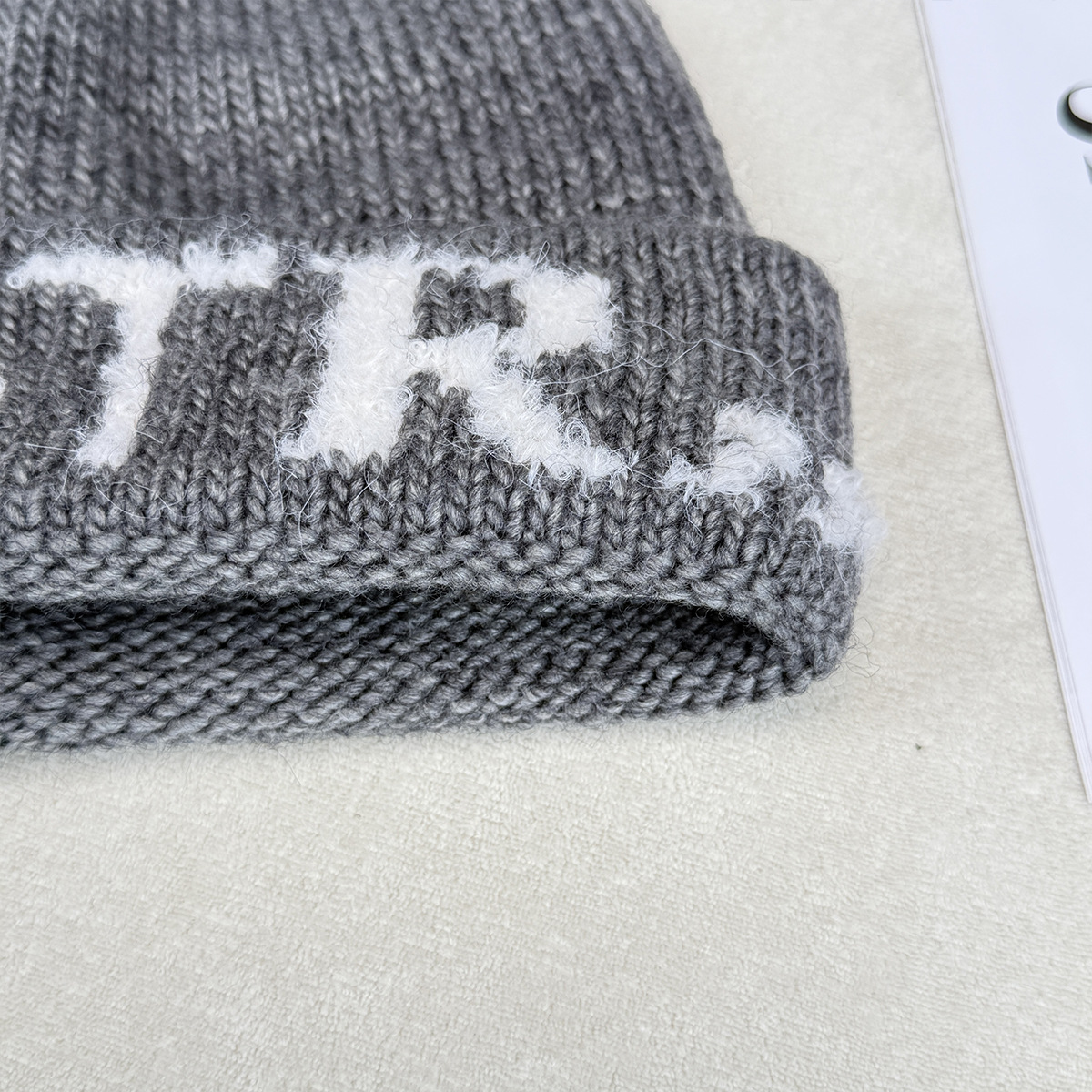 Korean style InS-style letter headwear, round face hat, small woolen knitted hat, warm head wrap for women in autumn and winter pic 11
